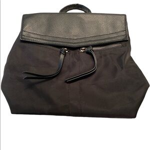 Botkier purse small backpack style adjustable straps magnetic closure